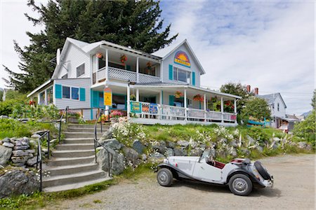 simsearch:854-05974498,k - A vintage convertable roadster parks outside the Cantina Restaurant in an historic Ft. Seward building, Haines, Southeast Alaska, Summer Stock Photo - Rights-Managed, Code: 854-05974262