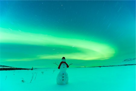 simsearch:854-03845542,k - Digitally Altered,Snowman watching Northern Lights, Winter, Eureka Summit, Glenn Highway, Southcentral Alaska Fotografie stock - Rights-Managed, Codice: 854-05974305