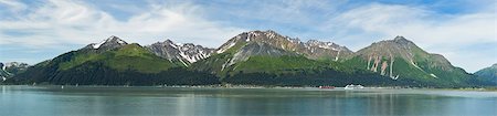 Composite panorama of Resurrection Bay, Seward, and Mount Marathon and the Kenai Mountains on the Kenai Peninsula in Southcentral Alaska. Summer. Afternoon. Stock Photo - Rights-Managed, Code: 854-05974447