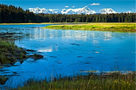 state park - The meandering Bartlett River beneath snow covered Fairweather Mountains on a sunny day, Glacier Bay National Park & Preserve, Southeast Alaska, Summer Stock Photo - Rights-Managed, Code: 854-05974548