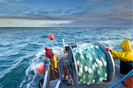 pacific coast usa alaska - The crew casts out the first set of a gillnet in Ugashik Bay, Bristol Bay region, Southwest Alaska, Summer Stock Photo - Rights-Managed, Code: 854-05974556