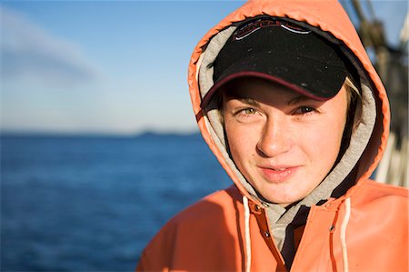 portrait outside work water - Woman In Her Raingear While Commercial Halibut Fishing In Southwest Alaska, Summer. Stock Photo - Rights-Managed, Code: 854-08028162