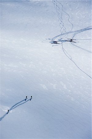 simsearch:854-02955228,k - Aerial of three downhill skiers hiking on a glacier toward two Super Cubs within Wrangell St. Elias Park Southcentral Alaska Stock Photo - Rights-Managed, Code: 854-02954903