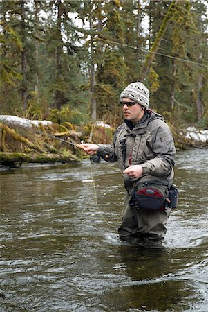 southeast animals - Fisherman Casts for Steelhead in Situk River  on a cool spring day in Southeast Alaska. Stock Photo - Rights-Managed, Code: 854-02954954