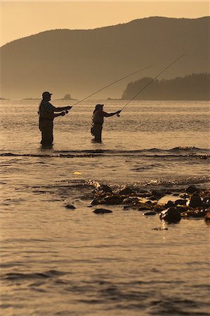 females in hip waders - Couple Flyfishing Shoreline of Sitka Sound Near Harbor Point in Southeast Alaska Stock Photo - Rights-Managed, Code: 854-02954951