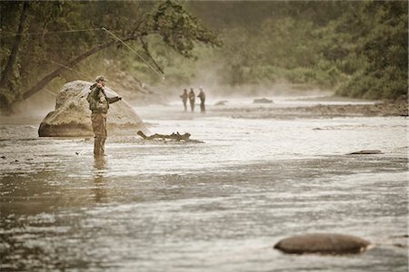 simsearch:854-03739710,k - Fly fisherman casting for Silver Salmon in the Anchor River at Anchor Point on the Kenai Peninsula in Southcentral Alaska during Fall Foto de stock - Con derechos protegidos, Código: 854-02954977