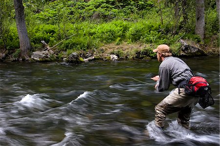 Pêche de Bienvenue à la truite sur la couche supérieure de la rivière russe péninsule Kenai en Alaska été Photographie de stock - Rights-Managed, Code: 854-02954988