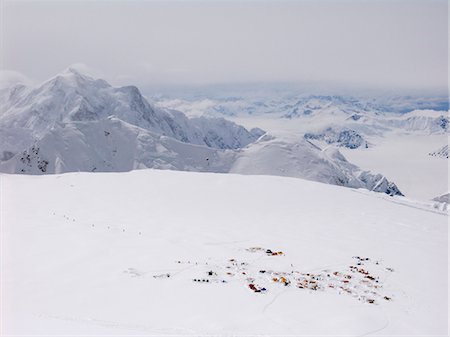 snow storm alaska - View of the 14,300-foot basin camp from the headwall at 15,500-feet on Denali's West Buttress route at Denali National Park. Spring in Interior Alaska. Stock Photo - Rights-Managed, Code: 854-02955052