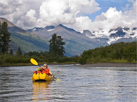 floating object on water - Woman packrafts down the 20 Mile River near Girdwood in Southcentral Alaska Stock Photo - Rights-Managed, Code: 854-02955092