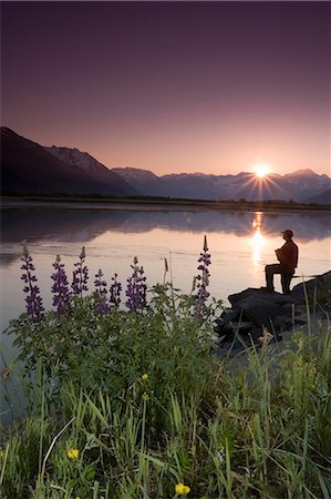 Hiker along 20-mile River @ sunrise stops near Lupine to view scenery Chugach National Forest AK Summer Stock Photo - Rights-Managed, Code: 854-02955179