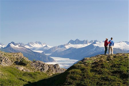 Couple hiking near Mendenhall Glacier Tongass National Forest Alaska Southeast Foto de stock - Con derechos protegidos, Código: 854-02955237