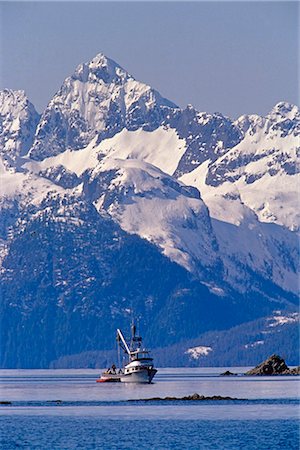 fishing boats usa - Commercial Fishing Boat in Prince William Sound SC AK Spring Chugach Mtns Stock Photo - Rights-Managed, Code: 854-02955508