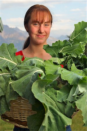 Portrait of a woman holding a basket of lettuce at the Alaska State Fair Stock Photo - Rights-Managed, Code: 854-02955555