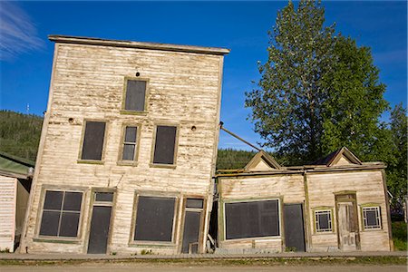 Historic buildings in Dawson City Canada collapsing due to melting permafrost Summer Stock Photo - Rights-Managed, Code: 854-02955571