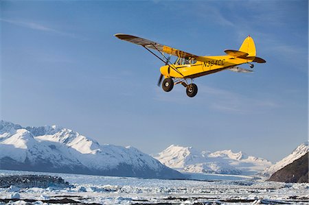 flight concepts - Piper Super Cub flying over Knik & Colony Glacier Matsu Valley Chugach Mountains Southcentral Alaska Summer Stock Photo - Rights-Managed, Code: 854-02955688