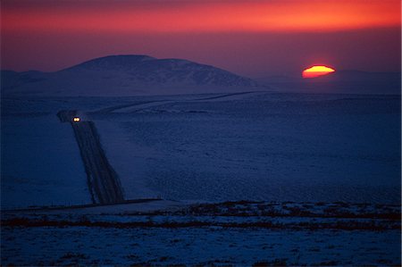 evening road with car lights - Road to Red Dog Mine Western Alaska Winter Sunset headlights Stock Photo - Rights-Managed, Code: 854-02955745