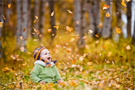 Young female child playing in the Fall leaves in an Anchorage park in Southcentral, Alaska Stock Photo - Rights-Managed, Code: 854-02955754