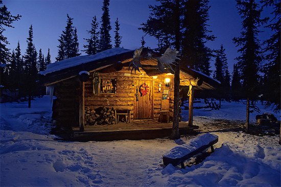 Interior Alaska Log Cabin Forest Winter Porch Light Snow Sky Dusk