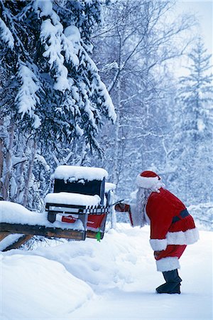 Santa Claus checking mailbox North Pole Interior Alaska winter portrait Foto de stock - Con derechos protegidos, Código: 854-02955868