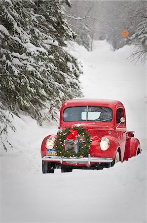 retro christmas person - Man driving a vintage 1941 Ford pickup with a Christmas wreath on the front during Winter in Southcentral, Alaska Stock Photo - Rights-Managed, Code: 854-02955860