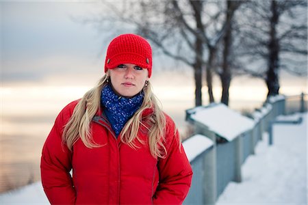 simsearch:854-03537981,k - Young woman talks on cell phone at the Baycrest pullout on the sterling highway near Homer, Alaska during Winter Stock Photo - Rights-Managed, Code: 854-02955935