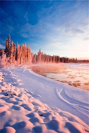 simsearch:400-04470126,k - Frosted spruce trees and fog rising over the Tanana River near Richardson Highway in Interior Alaska during Winter Stock Photo - Rights-Managed, Code: 854-02956029