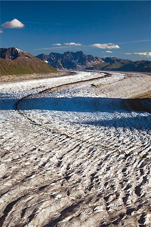 Aerial of Ruth Glacier flowing through Tokosha Mountains Denali National Park Interior Alaska Summer Foto de stock - Con derechos protegidos, Código: 854-02956065