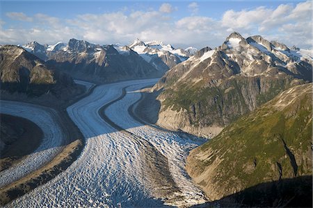 Aerial view of Gilkey Glacier Juneau Ice Field with latteral moraines becoming medial morraines southeast Alaska summer Stock Photo - Rights-Managed, Code: 854-02956073