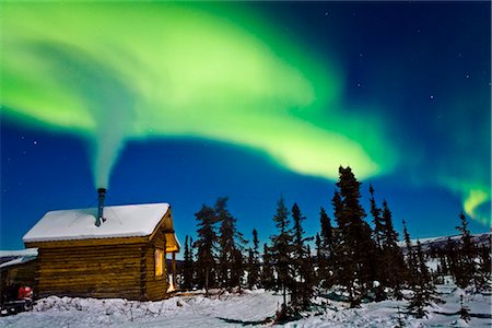 snowy log cabin night time - Aurora over cabin in the White Mountian recreation area during Winter in Interior Alaska. Stock Photo - Rights-Managed, Code: 854-02956105