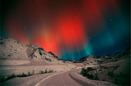 sky view mountain road winter - Red & Green Aurora dances above the Independence Mine at Hatcher Pass. Winter in the Matanuska Valley of Southcentral Alaska. Stock Photo - Rights-Managed, Code: 854-02956115