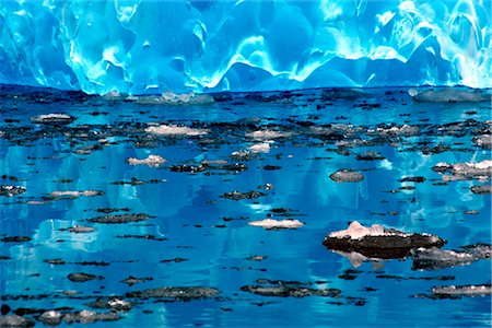 Tiny pieces of ice float near an iceberg in LeConte  Bay, Southeast, Alaska Stock Photo - Rights-Managed, Code: 854-02956126