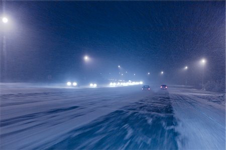 simsearch:854-08028197,k - Rush hour commmuter traffic on the Glen highway during a snow storm in Anchorage, Alaska Foto de stock - Con derechos protegidos, Código: 854-02956142