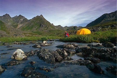 person kneeling in the creek - Man camping stream Hatcher Pass Talkeetna Mountains Southcentral Alaska summer scenic Stock Photo - Rights-Managed, Code: 854-03361762