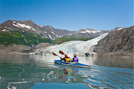 A Couple kayaking in Upper Shoup Bay, Shoup Glacier background, Shoup Bay State Marine Park, Prince William Sound, Alaska Stock Photo - Rights-Managed, Code: 854-03361785