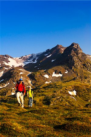 family hike - A father and son backpacking near Hatcher Pass in the Talkeetna Mountains with Bald Mountain Ridge in the background, Southcentral Alaska, Summer Stock Photo - Rights-Managed, Code: 854-03361822
