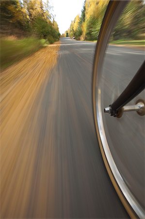 path wide angle - Wide angle view of a biycle tire in motion on a bike path in Anchorage, Southcentral Alaska, Autumn Stock Photo - Rights-Managed, Code: 854-03361851