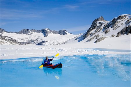 Man kayaking in melt pond on Juneau Ice Field Inside Passage Tongass National Forest southeast Alaska summer Stock Photo - Rights-Managed, Code: 854-03538097