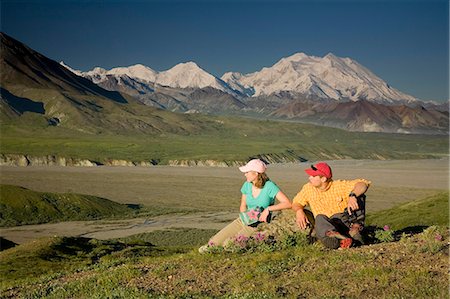 Young couple of visitors view MtMcKinley near the Eielson visitor center MtMcKinley Denali NP Alaska Stock Photo - Rights-Managed, Code: 854-03538144