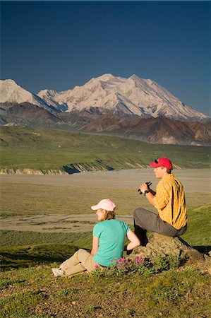 Young couple of visitors view MtMcKinley near the Eielson visitor center MtMcKinley Denali NP Alaska Stock Photo - Rights-Managed, Code: 854-03538146