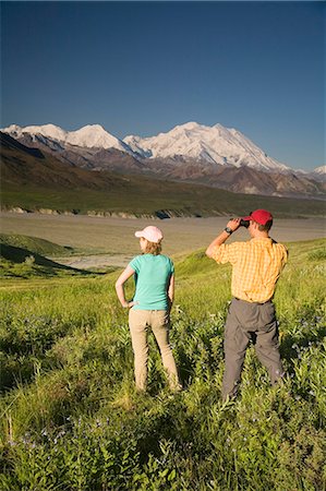 Young couple of visitors view MtMcKinley near the Eielson visitor center MtMcKinley Denali NP Alaska Stock Photo - Rights-Managed, Code: 854-03538148