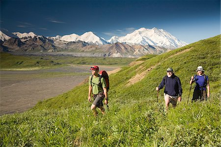 Family of three day hikers man and young couple at Grassy Pass with MtMcKinley in background Denali NP Alaska Stock Photo - Rights-Managed, Code: 854-03538167