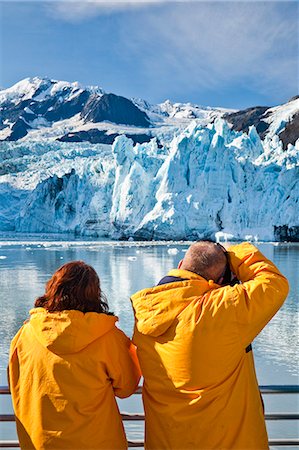 simsearch:854-03392534,k - Tourist couple view scenery on a Klondike Express Glacier Cruise tour with Stairway glacier (r) flowing into Surprise Glacier in Harriman Fjord, Prince William Sound, Alaska Stock Photo - Rights-Managed, Code: 854-03538552