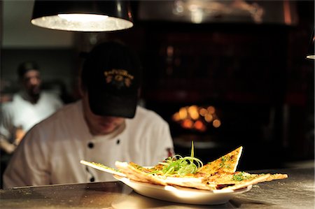 placing - An appetizer waits under a heat lamp at the Glacier Brewhouse restaurant in Downtown Anchorage, Southcentral Alaska, Summer/n Stock Photo - Rights-Managed, Code: 854-03646298