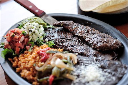 restaurant steak - Close up view of the Carne Asada taco plate at the Bear Tooth Grill retaurant in Anchorage, Southcentral Alaska, Summer/n Stock Photo - Rights-Managed, Code: 854-03646291