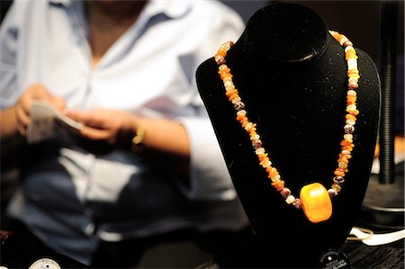 Close up view of a hand crafted necklace at the Alaska Native Heritage Center in Anchorage, Southcentral Alaska, Summer/n Stock Photo - Rights-Managed, Code: 854-03646321