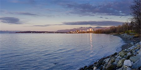 simsearch:854-03646780,k - View of the Anchorage skyline reflecting in the waters of Cook Inlet at sunset, Southcentral Alaska, Fall Stock Photo - Rights-Managed, Code: 854-03646355