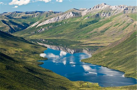 simsearch:854-03646625,k - Aerial view of blue sky reflecting in the clear waters of Wild Lake, north of Bettles, Arctic Alaska, Summer Foto de stock - Con derechos protegidos, Código: 854-03646634