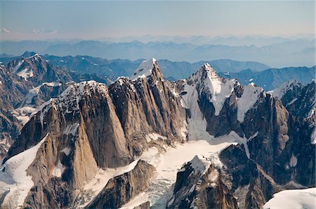 Aerial view of Moose's Tooth and the Alaska Range on a sunny day in Denali National Park and Preserve, Interior Alaska, Summer Stock Photo - Rights-Managed, Code: 854-03646643