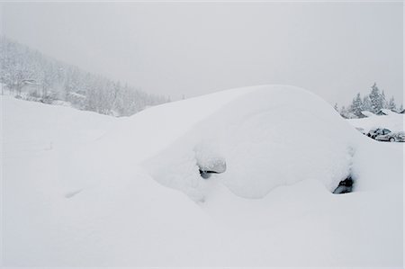 ski resort - A small car is buried in deep snow at the base of Alyeska Ski Resort during a snow storm, Girdwood, Southcentral Alaska, Winter Stock Photo - Rights-Managed, Code: 854-03646798