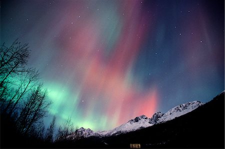 road in mountain in winter - Multi colored Northern Lights (Aurora borealis) fill the night sky off the Old Glen Highway near Palmer, Southcentral Alaska, Winter Stock Photo - Rights-Managed, Code: 854-03646790